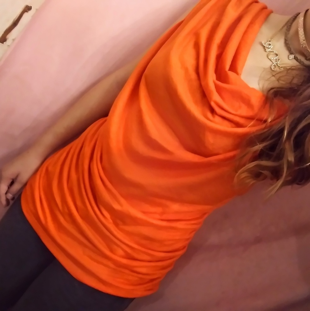 Sofia Vergara size large orange shirt